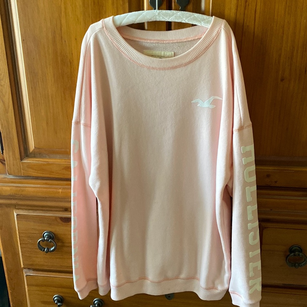 Hollister sweatshirt, ladies medium, pastel pink/white lettering. NEVER worn.